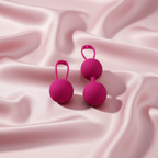 Boules de Geisha sur fond de soie rose
